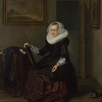 A Woman holding a Mirror