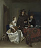 A Woman playing a Theorbo to Two Men