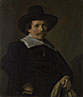 Portrait of a Man holding Gloves