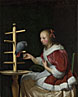 A Woman in a Red Jacket feeding a Parrot